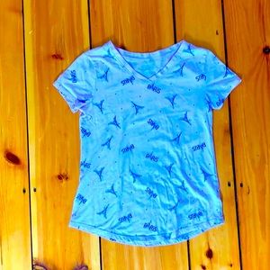 Cute purple t shirt With designs on it